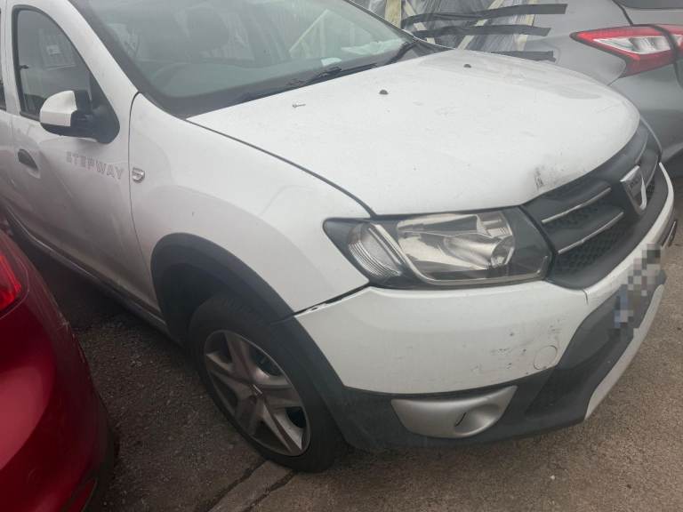 Breaking spare parts dacia sandero white