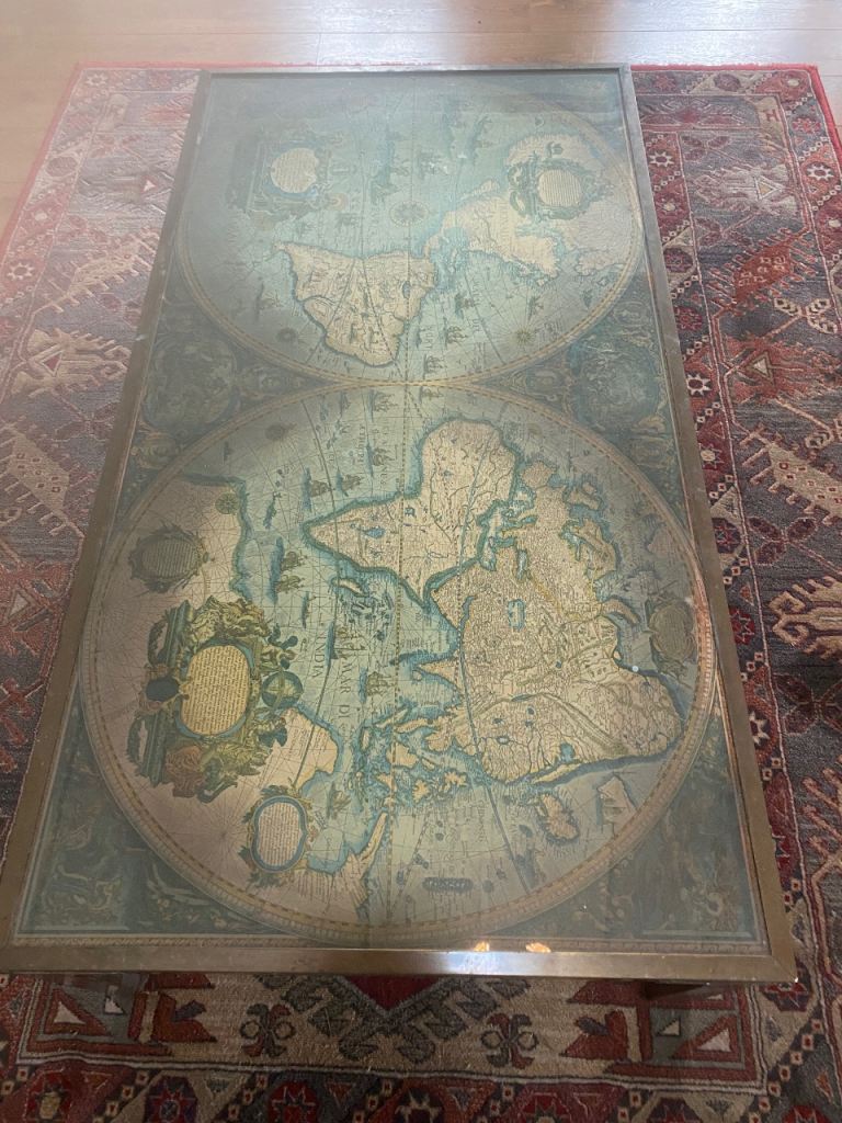 Vintage coffee table with map inside