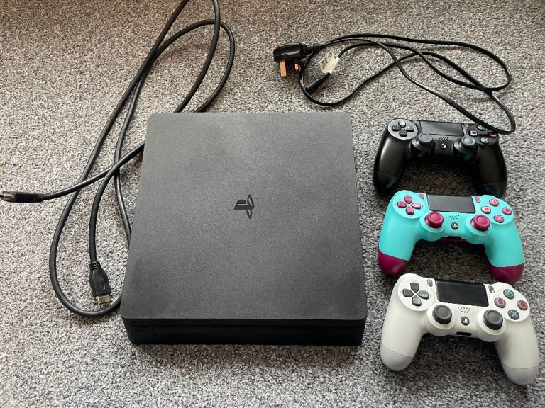 image for PlayStation 4 Slim Console + 3 Controllers