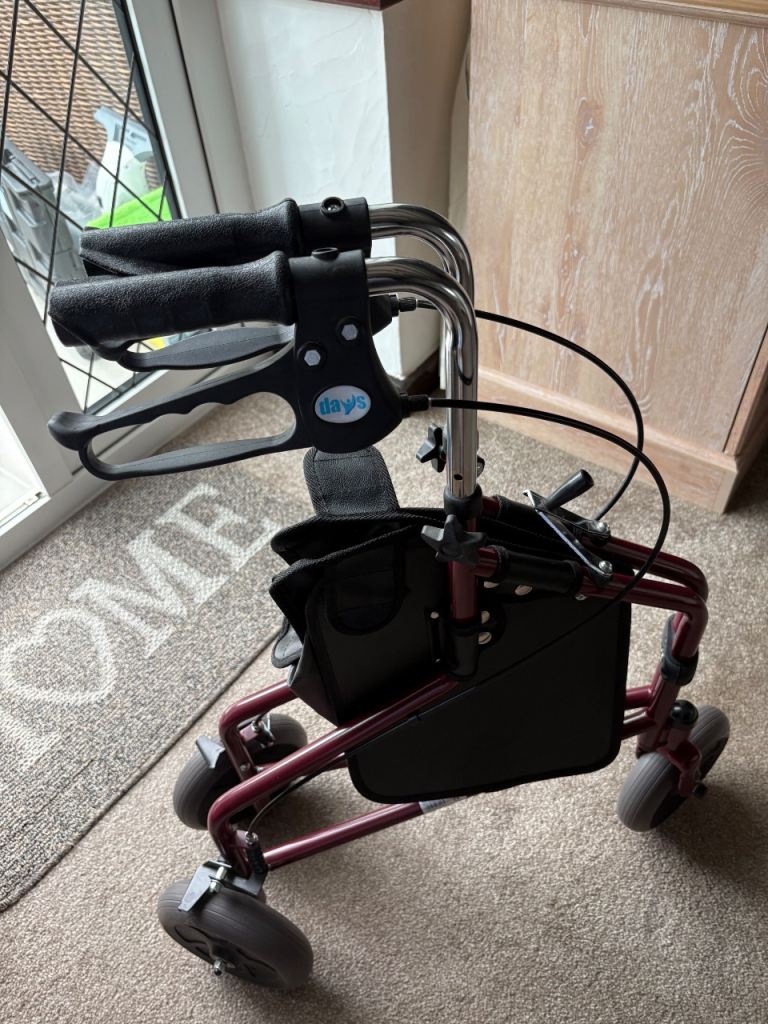 Red Mobility Walker with Seat and Bag – Good Condition