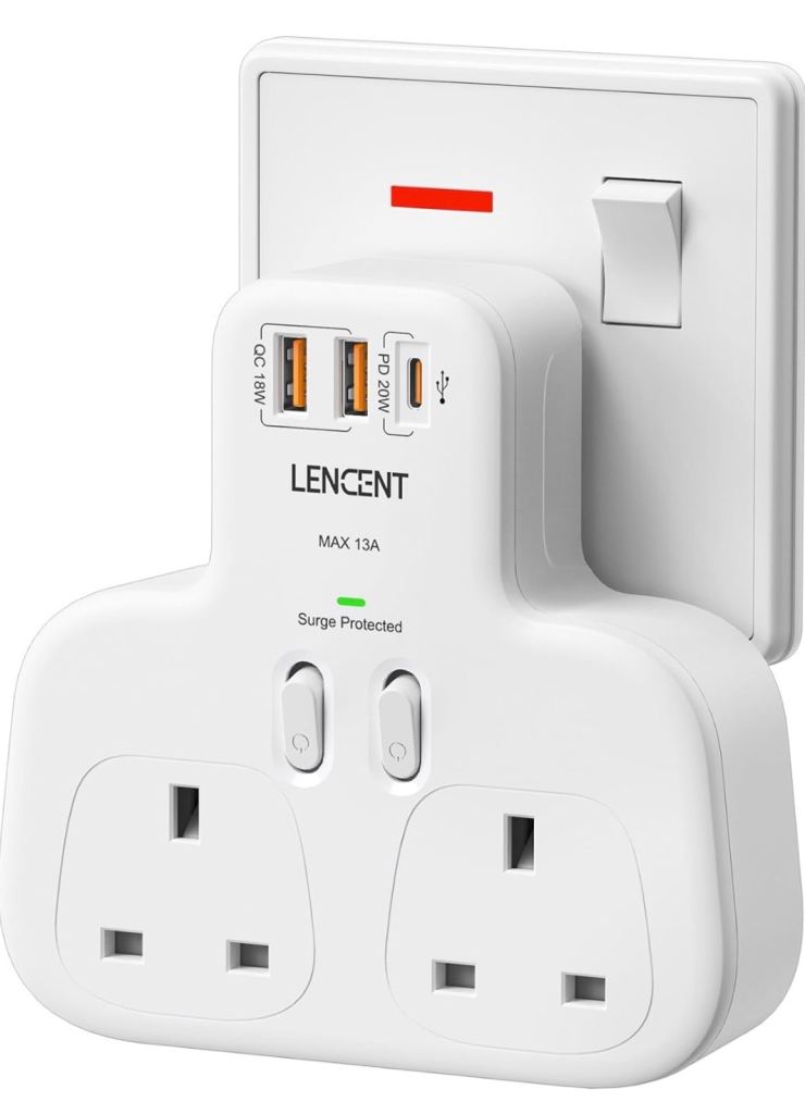 plug-in double socket with USB charging ports or a UK double socket adaptor with USB ports.