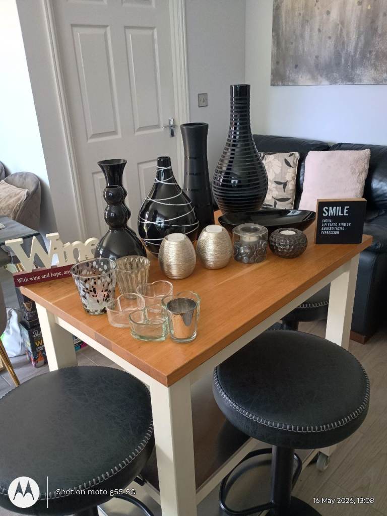 Black vases and candle holders 
