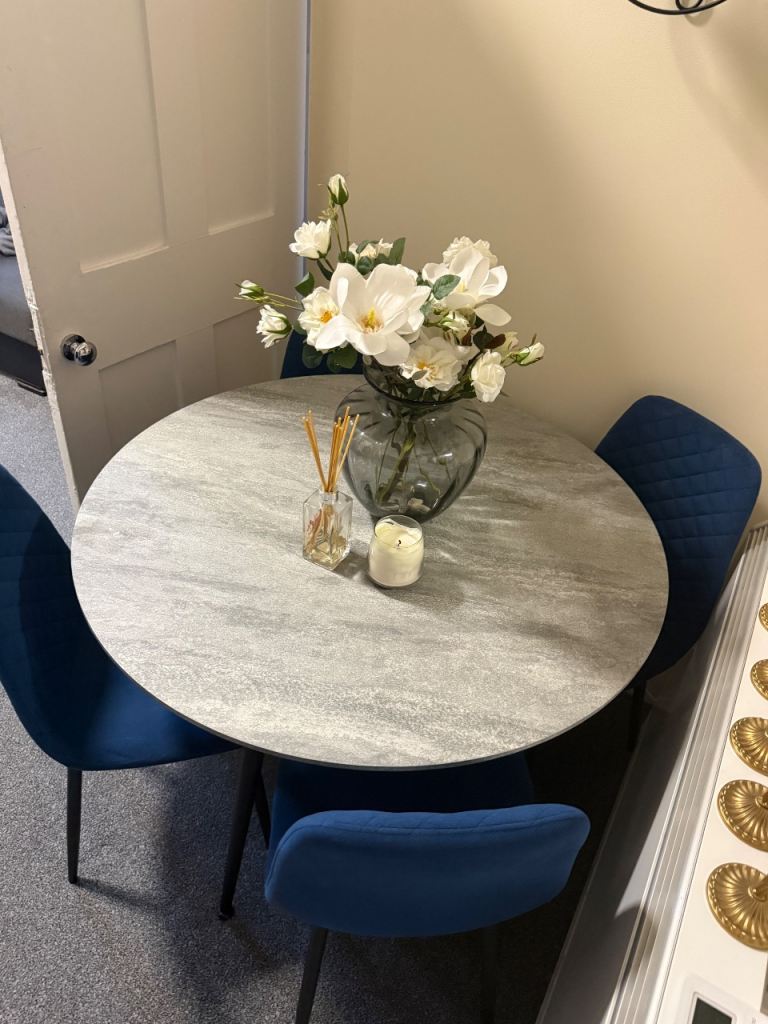 Modern Grey Round Dining Table with 4 Blue Velvet Chairs