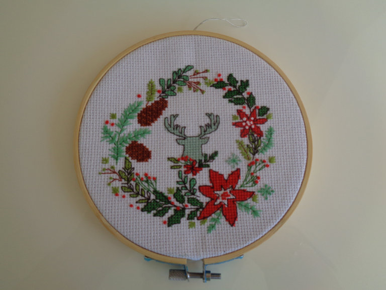 Cross stitched framed Christmas sampler