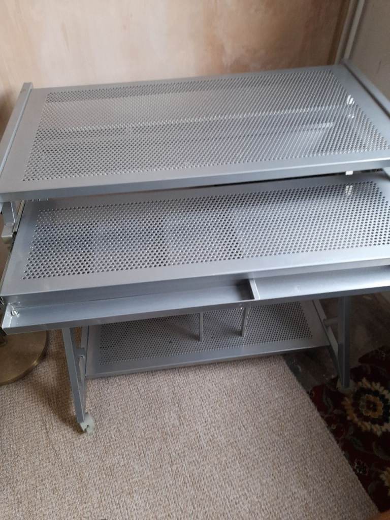 Lightweight metal desk on casters 