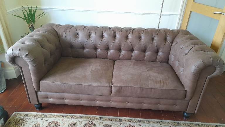 Ikea brown Chesterfield style sofa