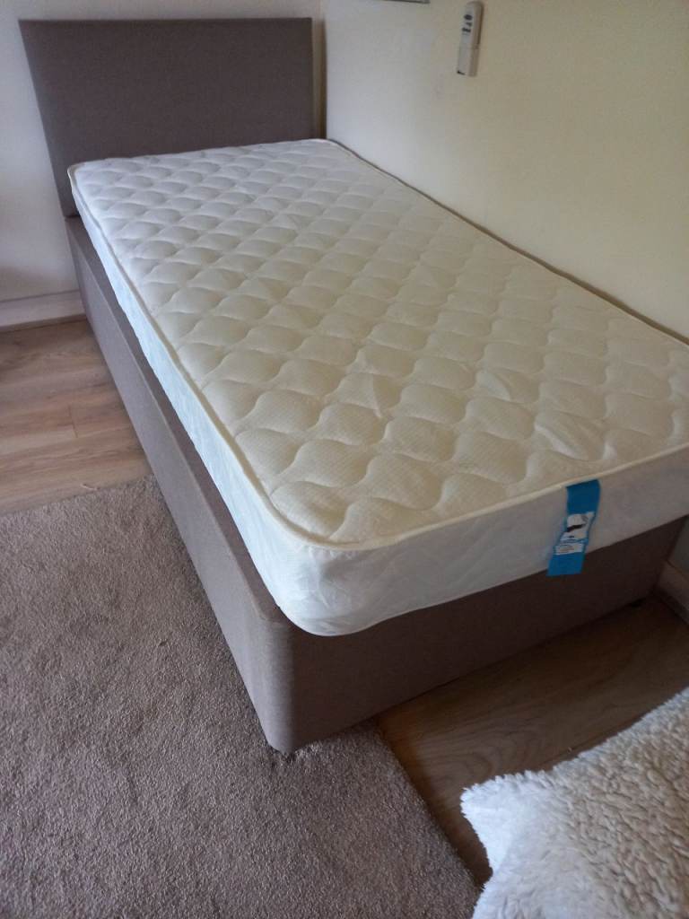 SINGLE BED WITH MATTRESS.