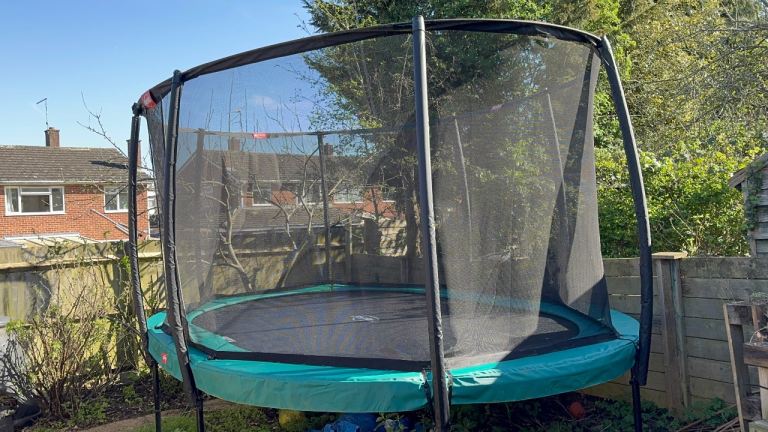 Large Garden Trampoline with Safety Net – Good Condition