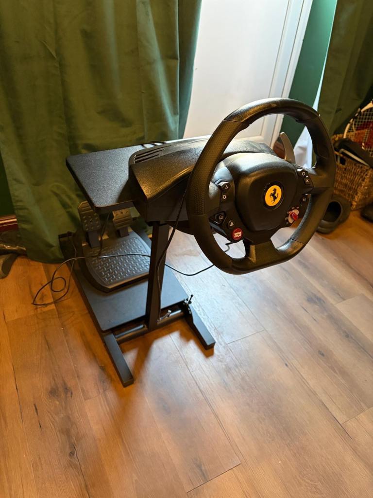 T98 Ferrari 296 GTB Thrustmaster with a stand