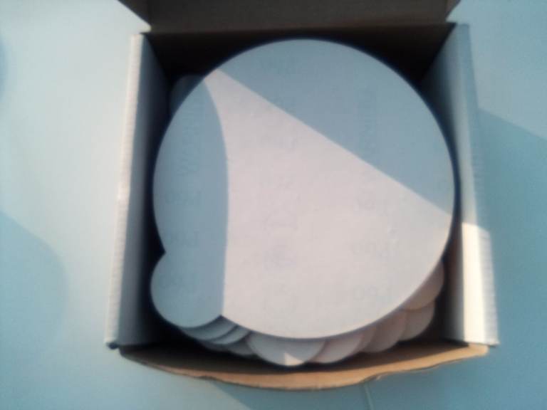 Box of new self adhesive sanding disks. £7