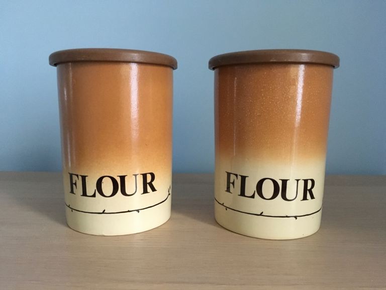 Two vintage ceramic flour storage jars