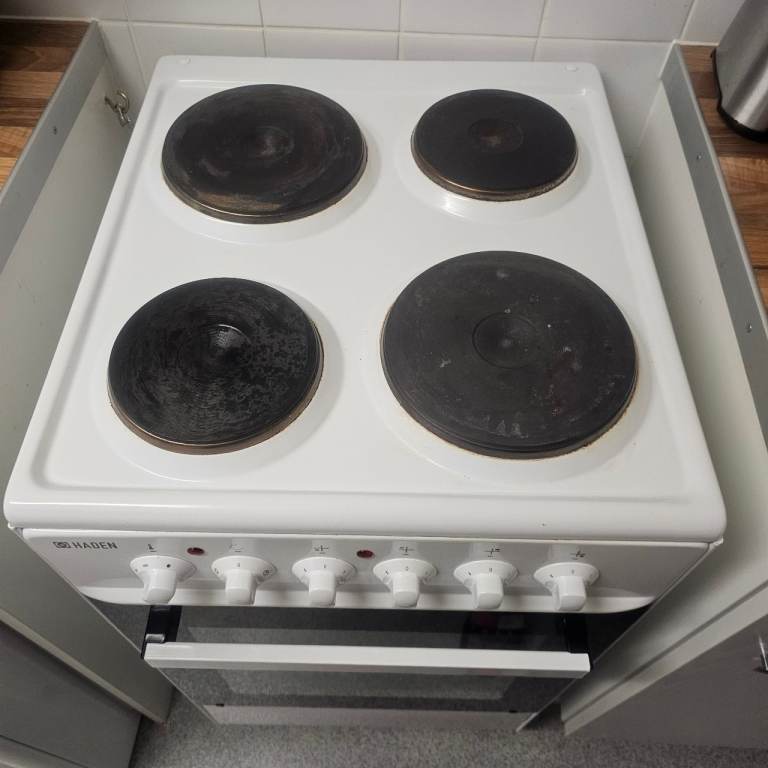 New but used 4 burner  electric  stove