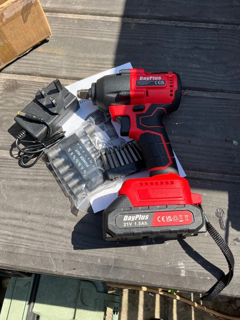 DayPlus 21V Cordless Impact Wrench with Battery, Charger & Sockets New Item