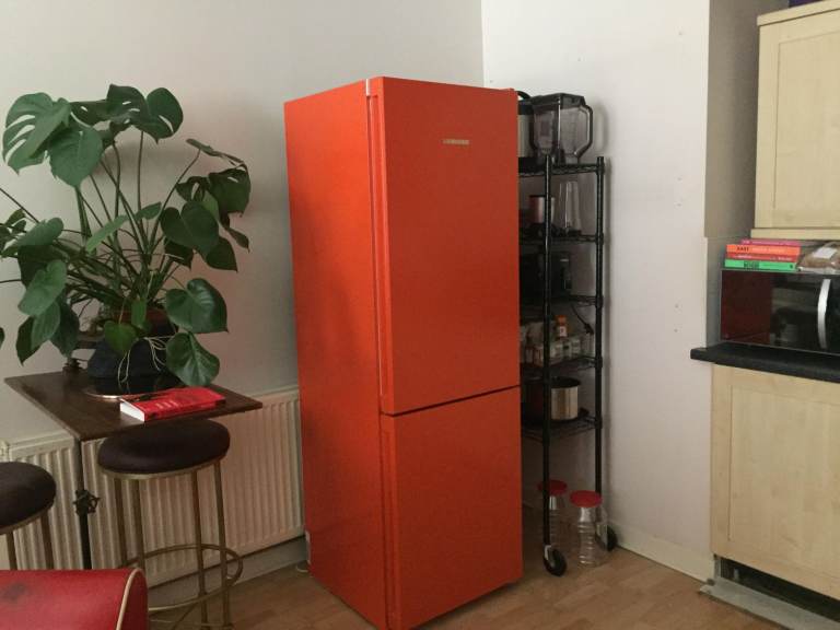 Liebherr 70/30 freestanding fridge freezer in orange