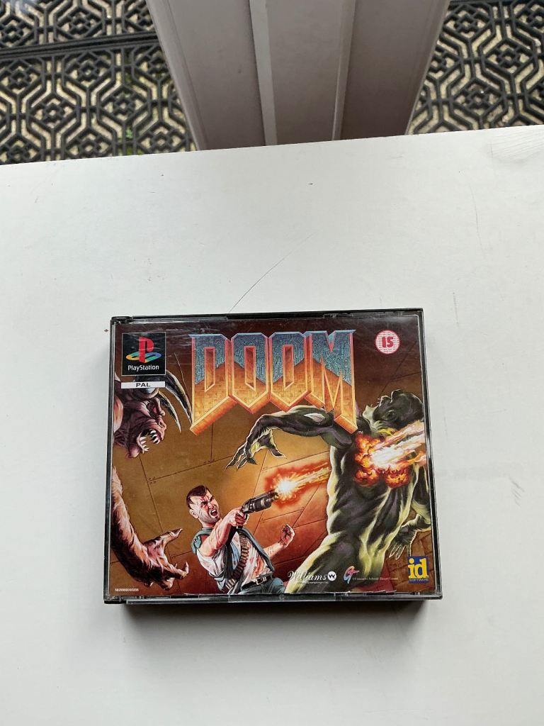 PlayStation one game DOOM in double case & manual is complete 