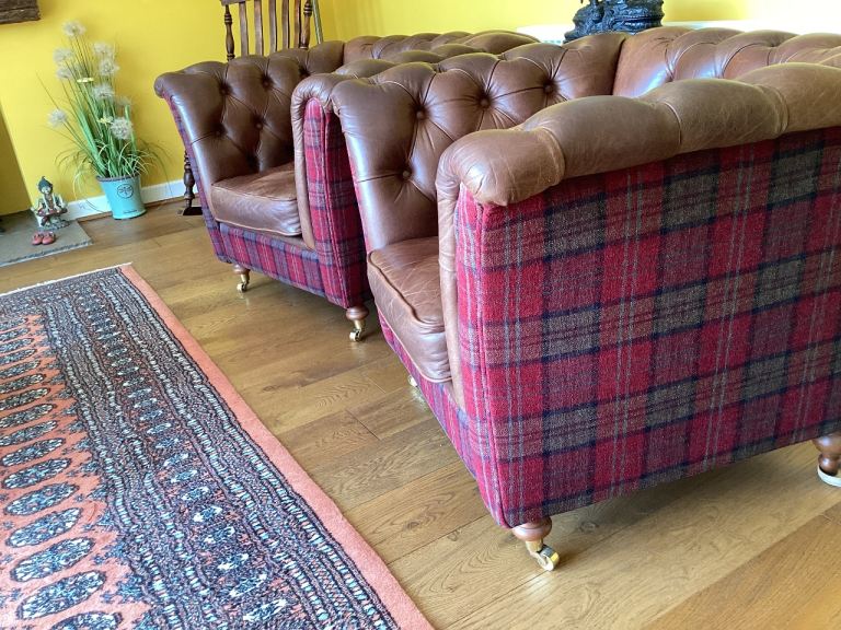 2 x brown leather Chesterfield armchairs 