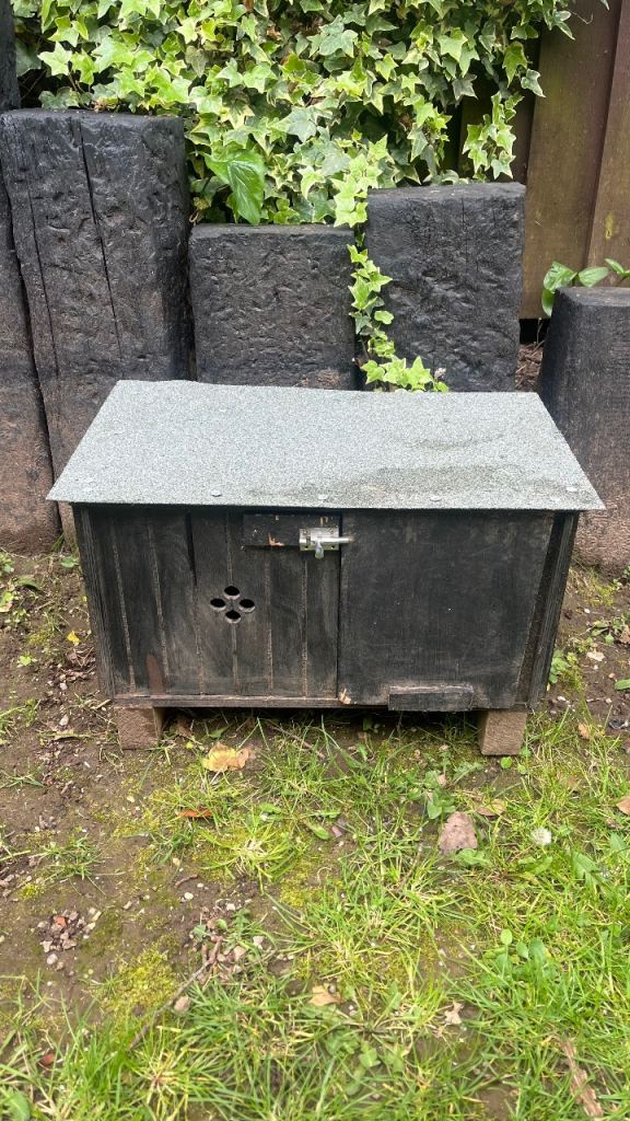 Wooden outdoor tortoise house 