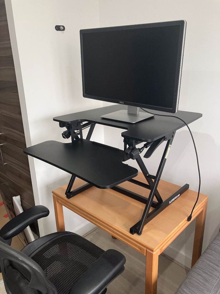 Flexispot standing desk converter / riser for 27" monitors — boxed, excellent condition