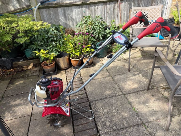 Mantis GX25 2hp 4 stroke Honda engine.