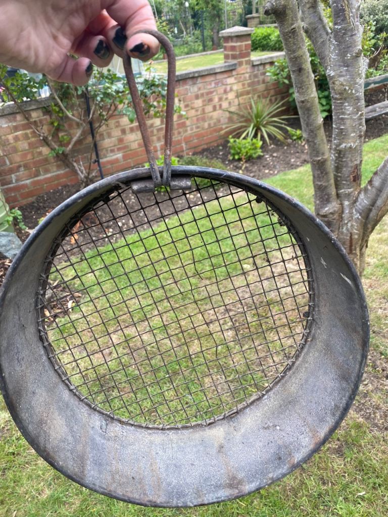 Galvanised metal sieve