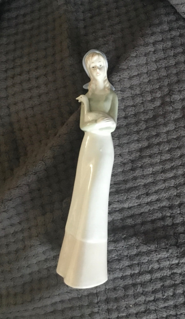 Pottery Ceramic Ornament: Lady holding a Goose