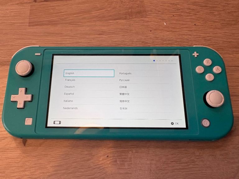 Nintendo Switch Lite Console Blue with Case, Charger and Headphones