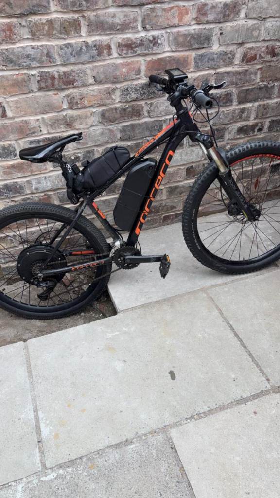 Converted  Carrera 27.5 wheels electric bike goes  35 mph not for kids