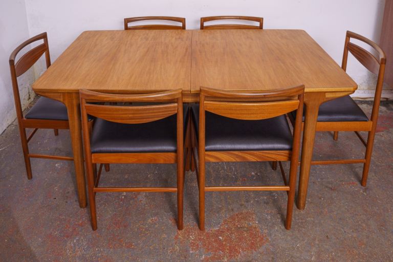 McIntosh mid-century teak double extending dining table with 6 chairs 