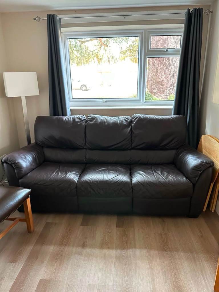 Comfortable Brown Leather Three-Seater Sofa – Good Condition