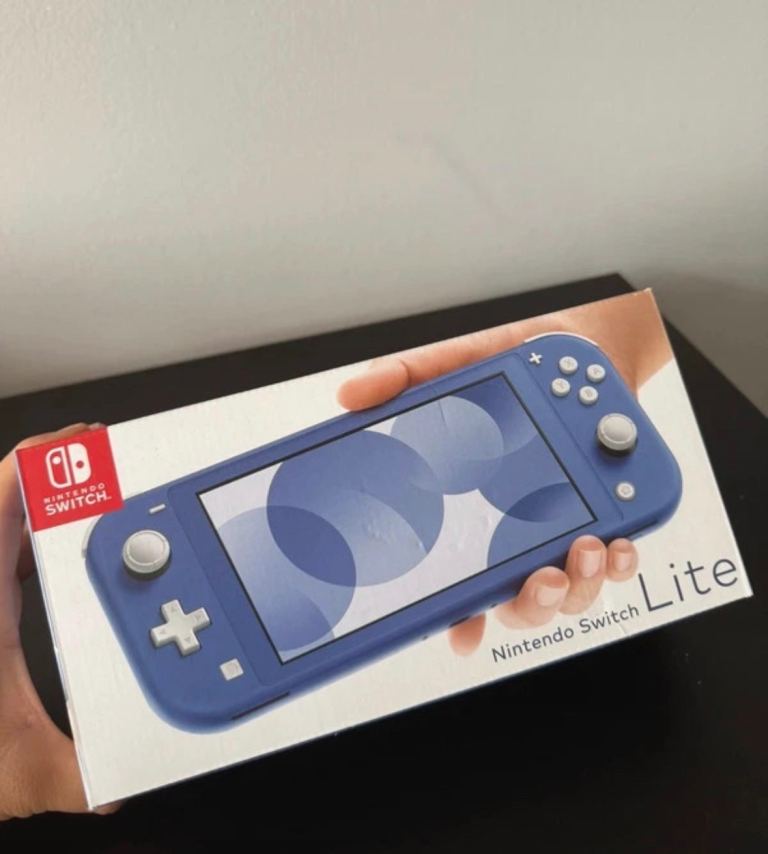 Nintendo Switch Lite Blue.A code for a FREE 30-day trial is included in this box 