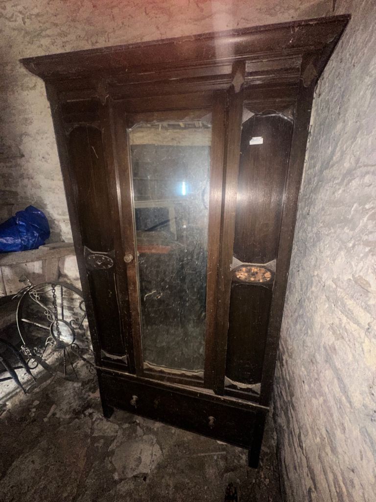 Antique wardrobe with mirrored door