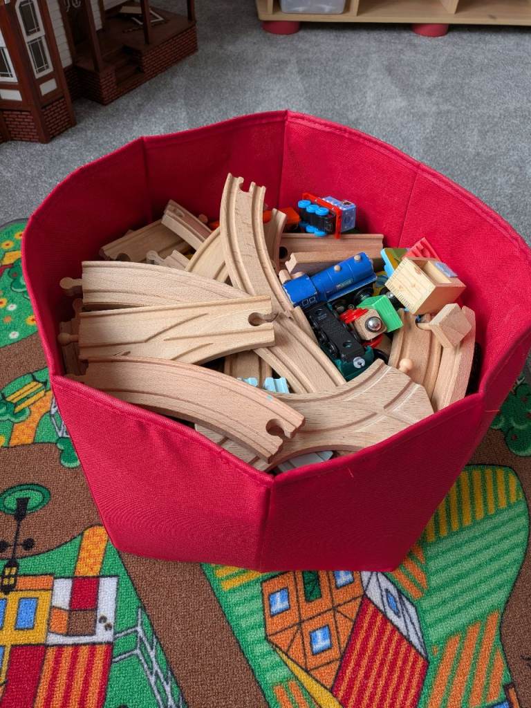 Wooden Toy Train Tracks and Trains in Red Storage Bin