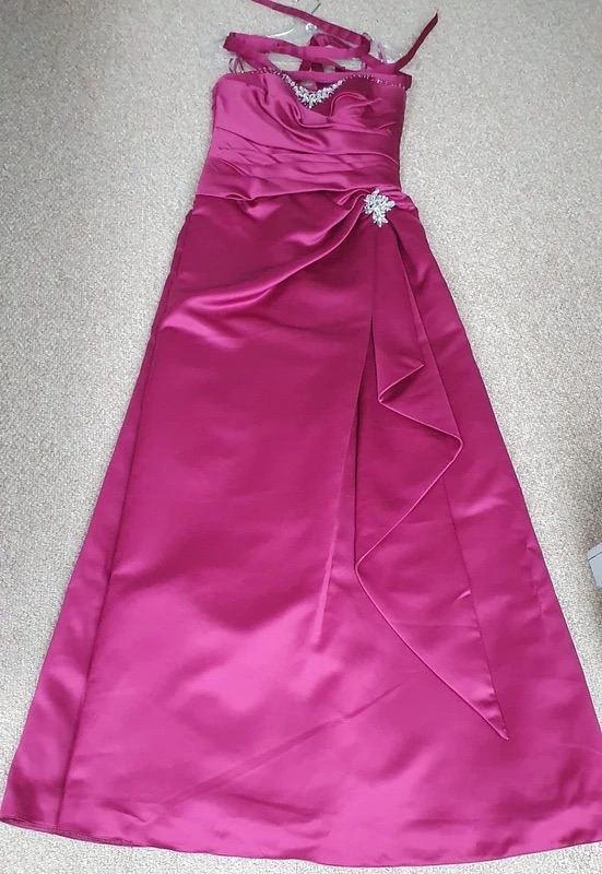 Beautiful burgundy ballgown with berry tones