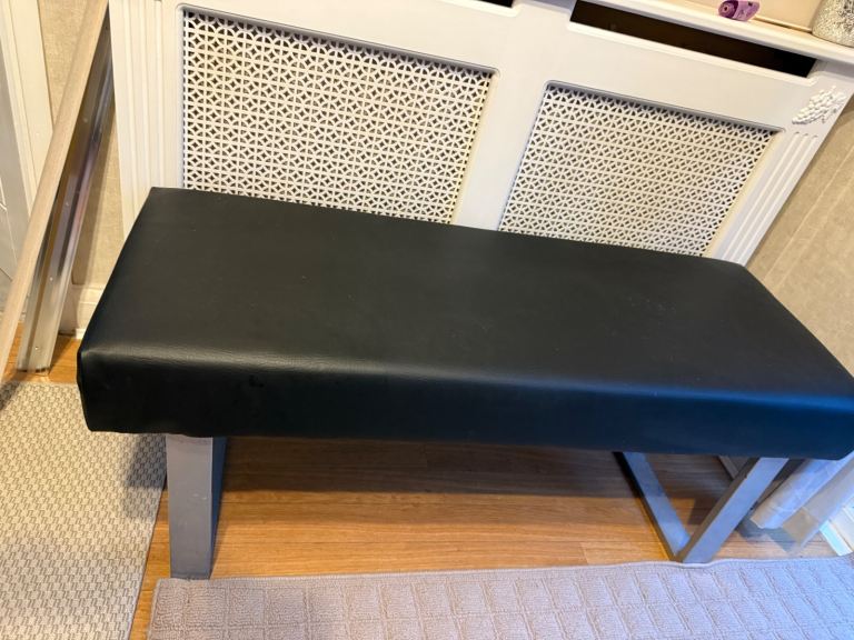Black faux leather dining bench