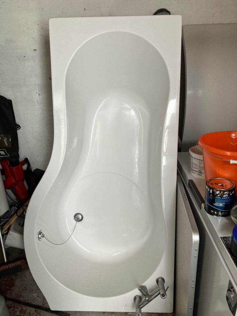 White Curved Bathtub with Taps and Plug Chain