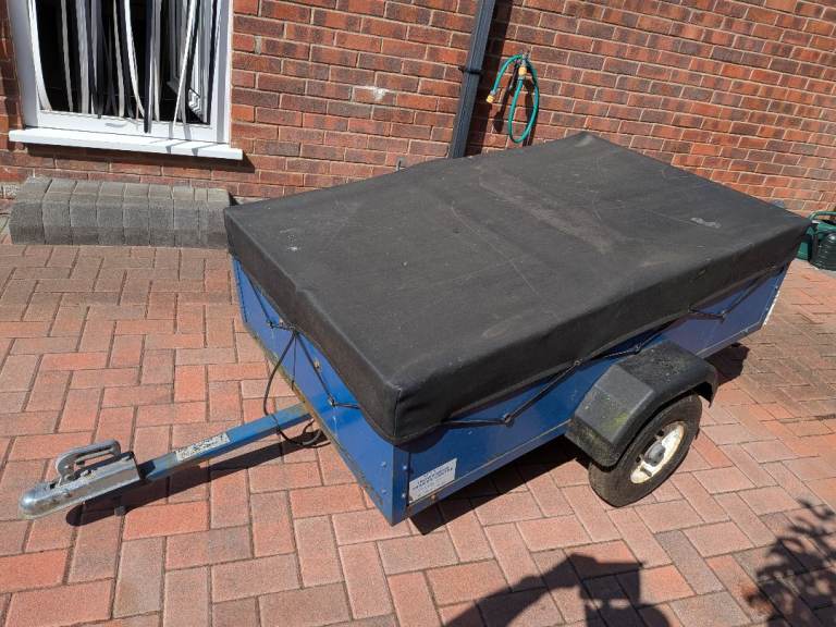 Trailer- With heavy duty cover, coupling lock and spare wheel.