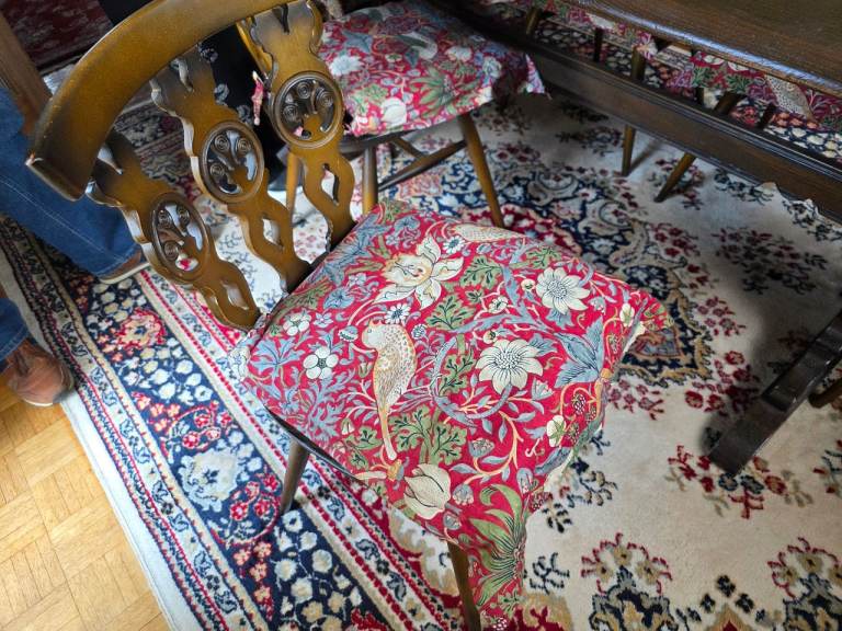 Ercol dining table with 6 chairs 