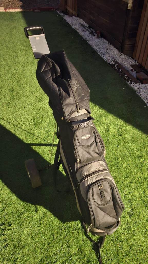 Hippo golf cart bag and trolley with various clubs