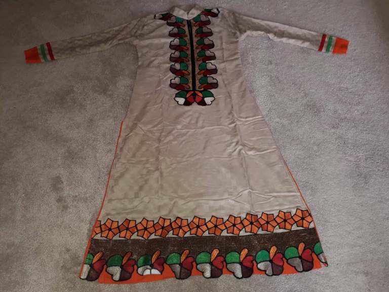 Beige/Orange Coloured Salwar Kameez with floral patterns (Small Ladies)