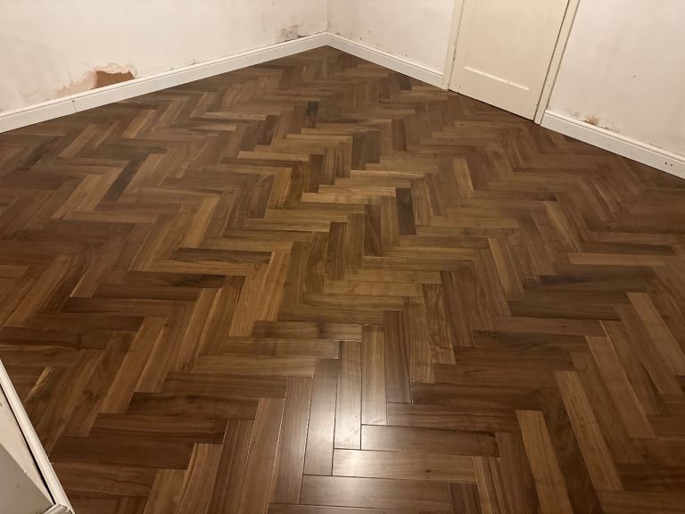 Laminate herringbone vinyl Engineered wood flooring | Handyman | Skirting board installation 