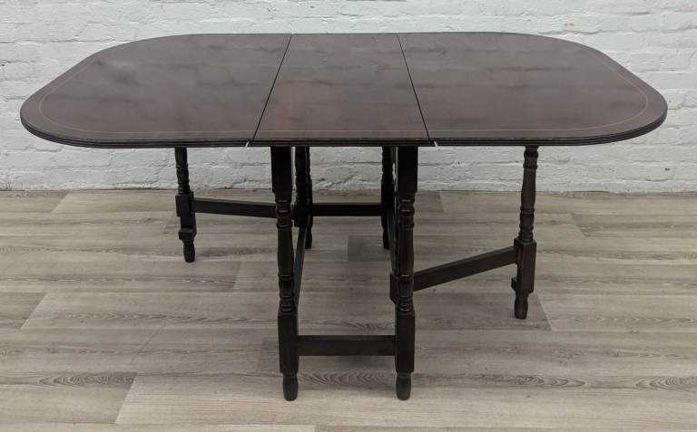 Reproduction inlaid mahogany gateleg dining table