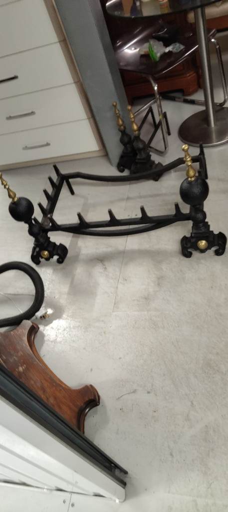 Cast iron fire dogs and grate 