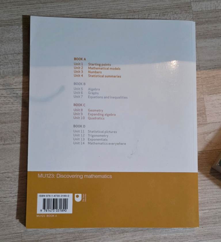 The Open University's "Discovering Mathematics" MU123 module books A, B, C, D