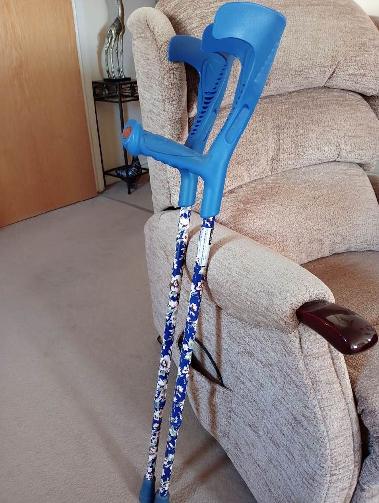 Two Walking Stick Aids