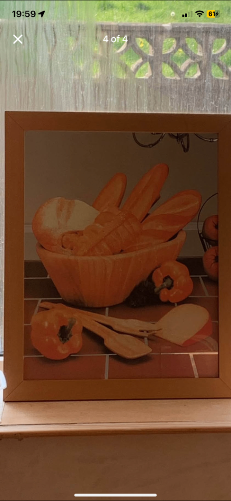 Picture and mirror on top part for a kitchen