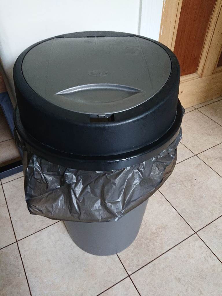 Grey waste bin