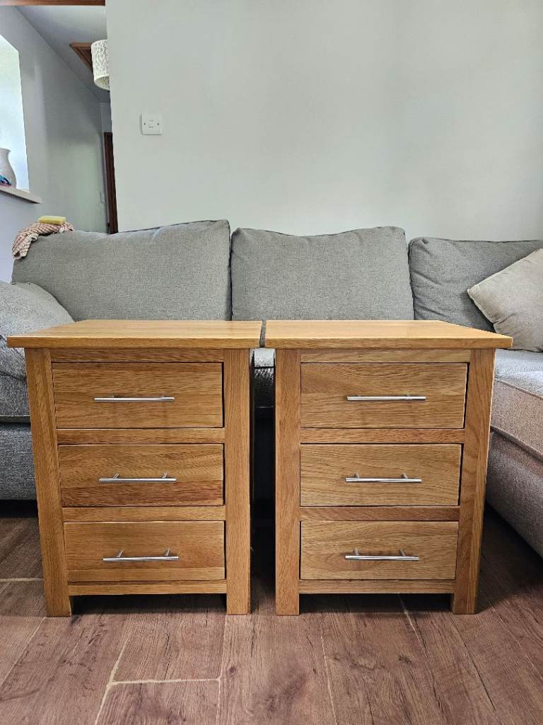 Two solid oak bedside tables.