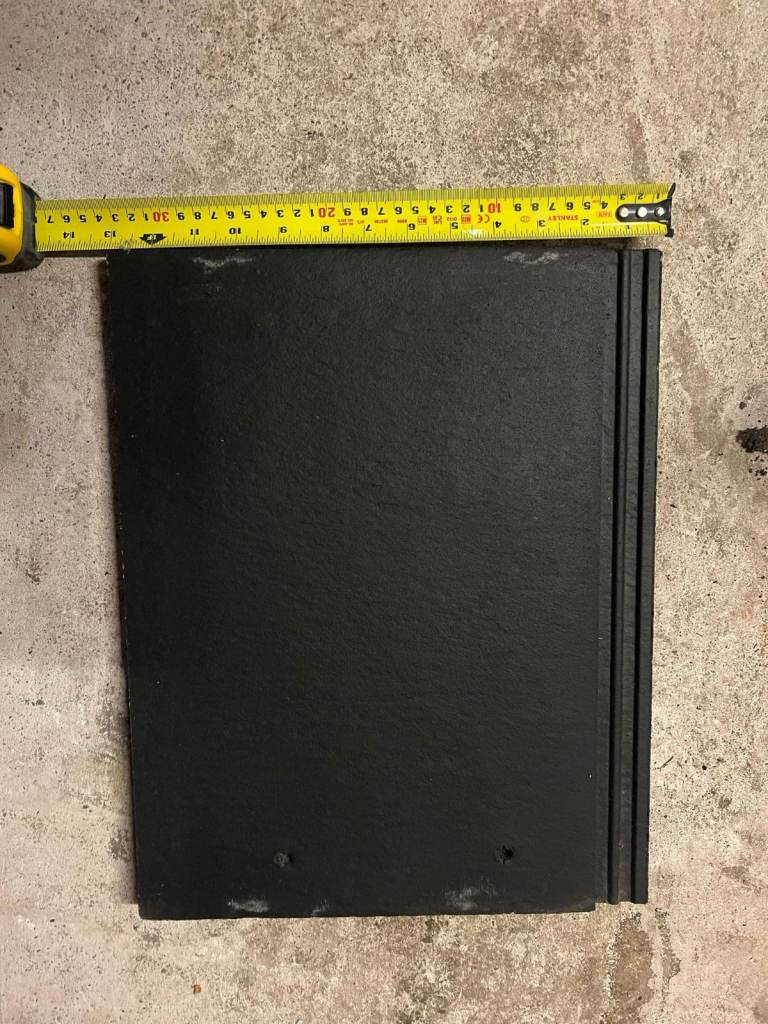 76 new/unused roof tiles - Marley smooth dark grey slate