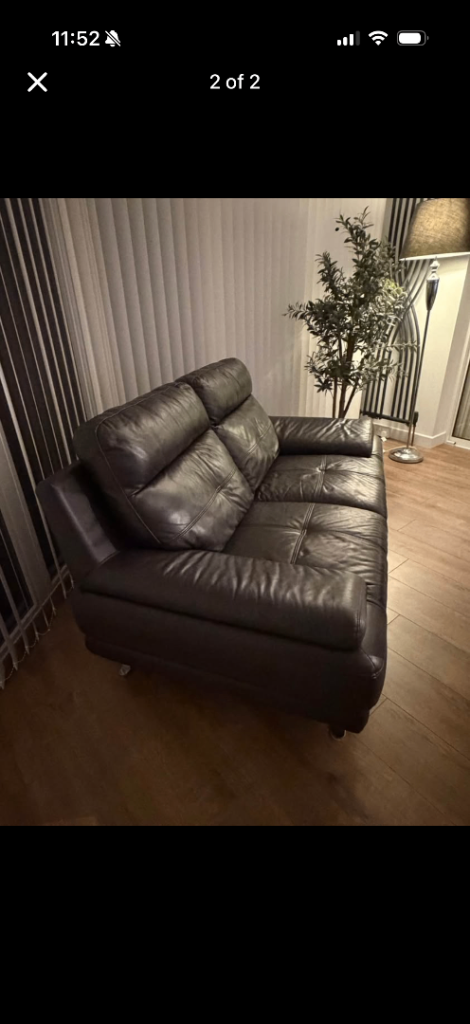 Brown Leather Two-Seater Sofa – Good Condition