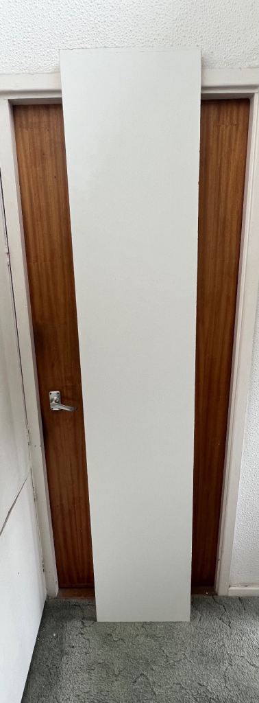 A LARGE PIECE OF MELAMINE BOARD